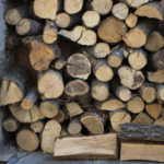 dry wood for heating ovens stacked on each other